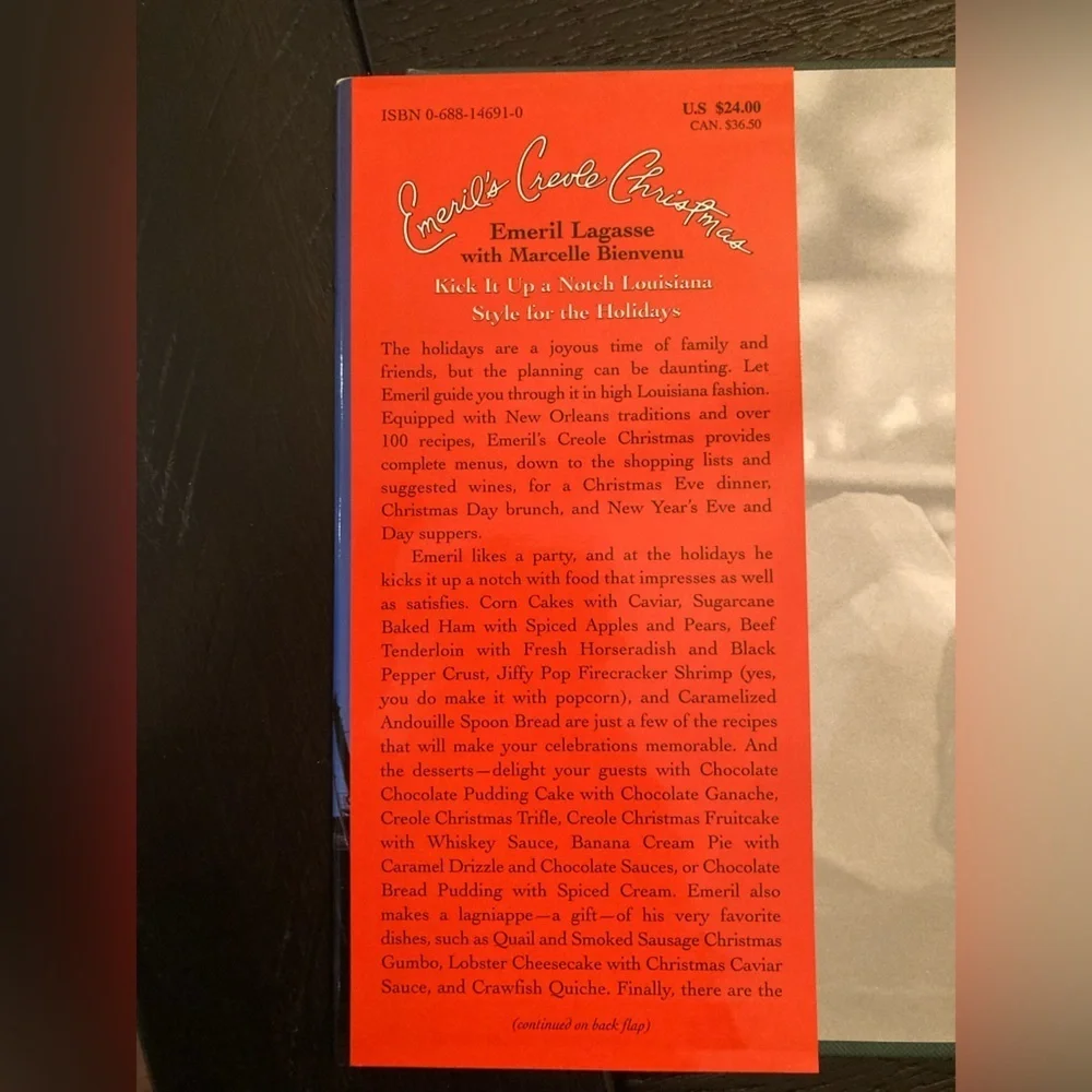 Emerils Creole Christmas autograph cookbook.